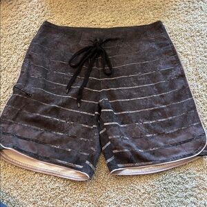 Niyama Sol Men’s Black Striped Swim Shorts